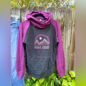 Comfy sweatshirt with unique scrunch neck that side buttons